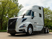 Front and driver side of white 2027 Volvo VNL 860