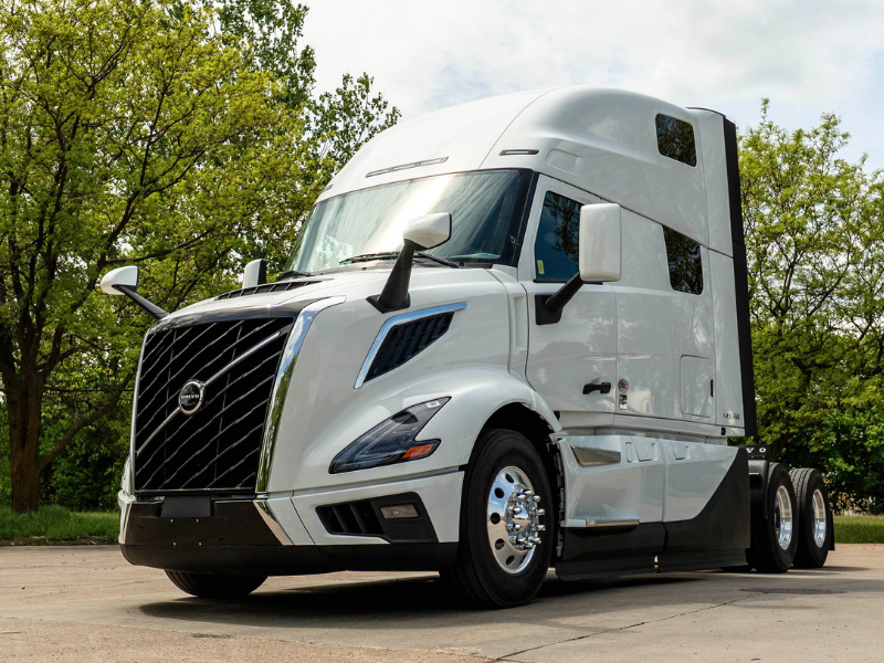 Front and driver side of white 2027 Volvo VNL 860