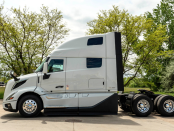 Driver side of white 2027 Volvo VNL 860