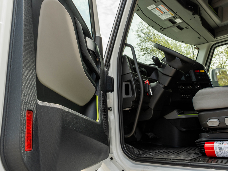 Driver side door open looking into cab of 2027 Volvo VNL 860