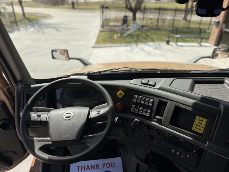 Steering wheel and dashboard inside a 2023 Volvo VNL 760