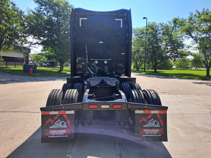 Rear of 2022 Black Peterbilt 579