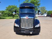 Front of 2022 Black Peterbilt 579
