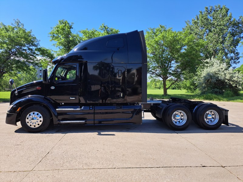 Driver's side of 2022 Black Peterbilt 579