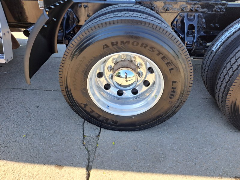 Wheels and tires of a 2022 Black Peterbilt 579