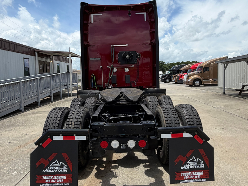 Rear of a maroon 2022 Kenworth T680