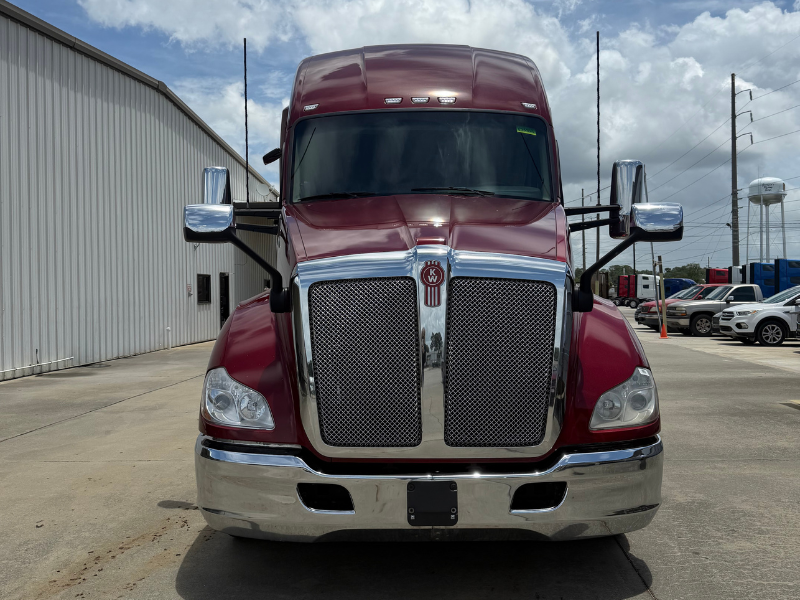 Front of a maroon 2022 Kenworth T680