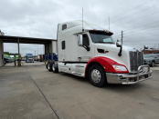 Front and passenger side of a 2022 Peterbilt 579 semi truck