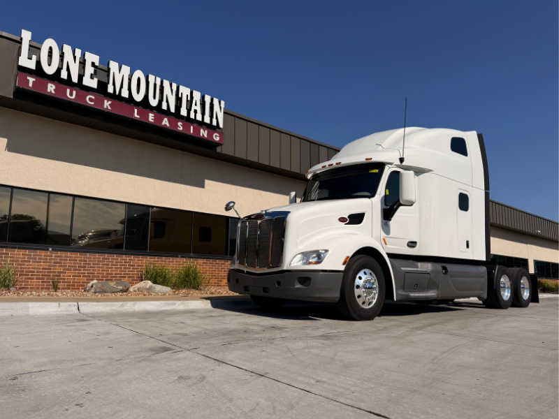 White 2022 Peterbilt 579 parked outside the Lone Mountain Truck Leasing headquarters in Carter Lake, Iowa
