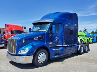 Blue 2022 Peterbilt 579 semi truck