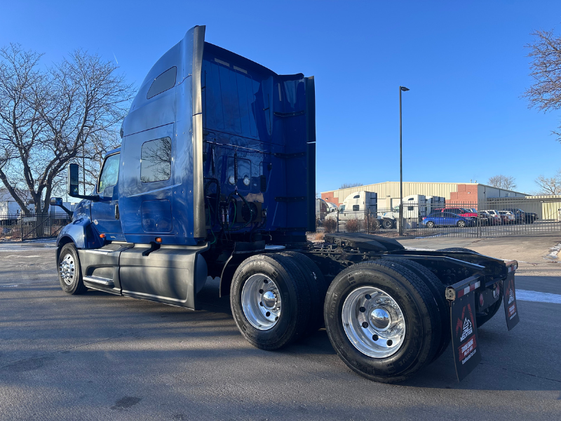 Driver's side and rear of a blue 2022 International LT