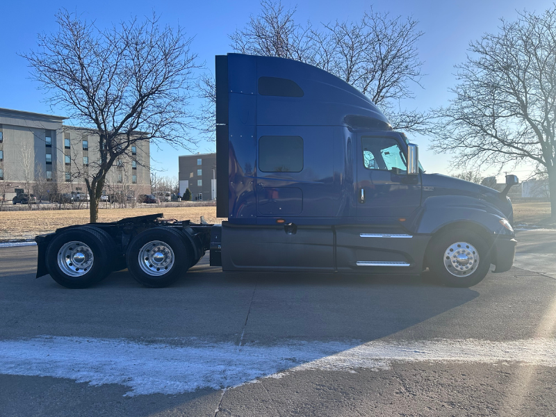Passenger's side of a blue 2022 International LT
