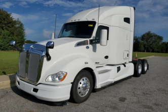 White 2021 Kenworth T680 driver's side and front