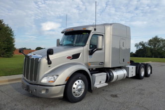 Front and driver side Silver 2021 Peterbilt 579