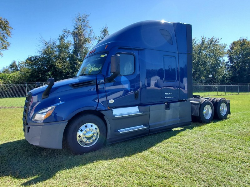 Blue 2022 Freightliner Cascadia front driver's side