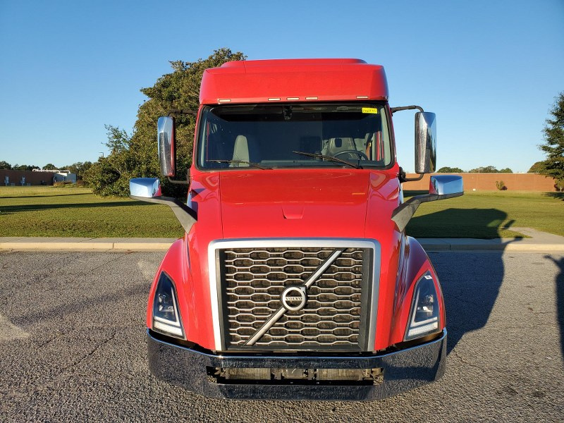 Front of a red mid-roof 2023 Volvo VNL 740