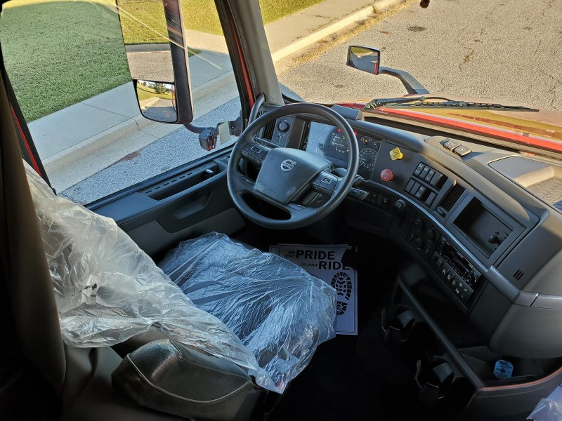 Driver's side interior of a 2023 Volvo VNL 740